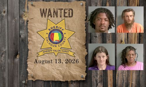 Wanted photo with 4 mugshots on old west wood planked wall with wanted poster and Sheriff's Office star