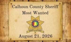Old west parchment with Calhoun County Sheriff Most Wanted words and Sheriff Star