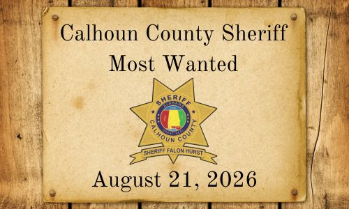 Old west parchment with Calhoun County Sheriff Most Wanted words and Sheriff Star