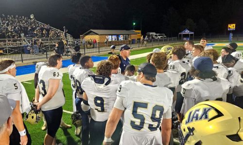 Jacksonville coach Jeremy Sullivan talks to his team after the Golden Eagles’ victory at Piedmont on Aug. 21. Jacksonville will play at Oxford on Friday. (Photo by Joe Medley/East Alabama Sports Today)