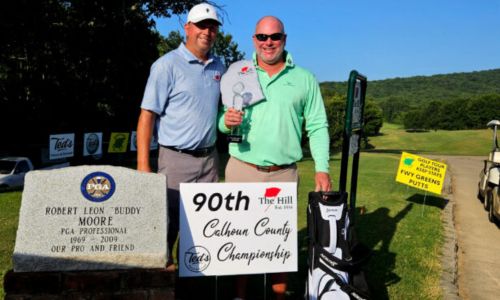 Ty Cole (right) celebrates with Calhoun County Championship director Matt Rogers on Sunday at Anniston Municipal Golf Course. Cole won the 90th County Championship and clinched his eighth player-of-the-year honor on the Calhoun County Golf Tour. (Photo by Joe Medley/East Alabama Sports Today)