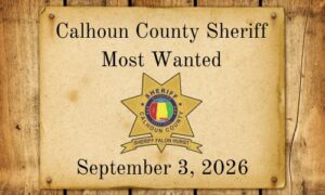 Old west parchment with Calhoun County Sheriff Most Wanted words and Sheriff Star