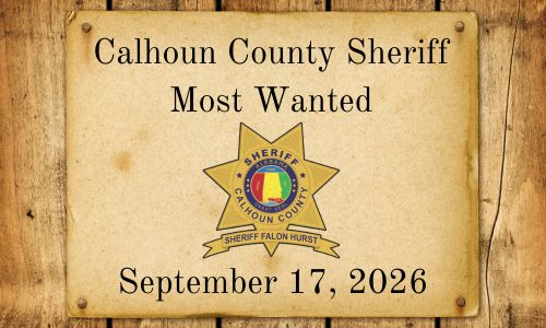 Old west parchment with Calhoun County Sheriff Most Wanted words and Sheriff Star
