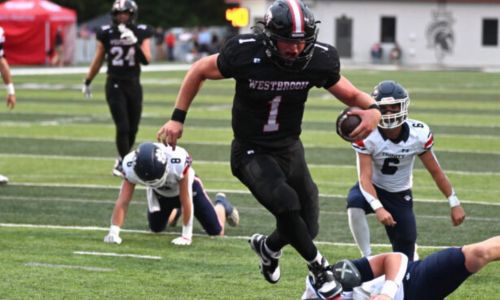 Westbrook Christian quarterback Brody Blevins runs for a touchdown against Trinity Presbyterian Friday at Rainbow City. (Photo by Ken Grissom/For East Alabama Sports Today)
